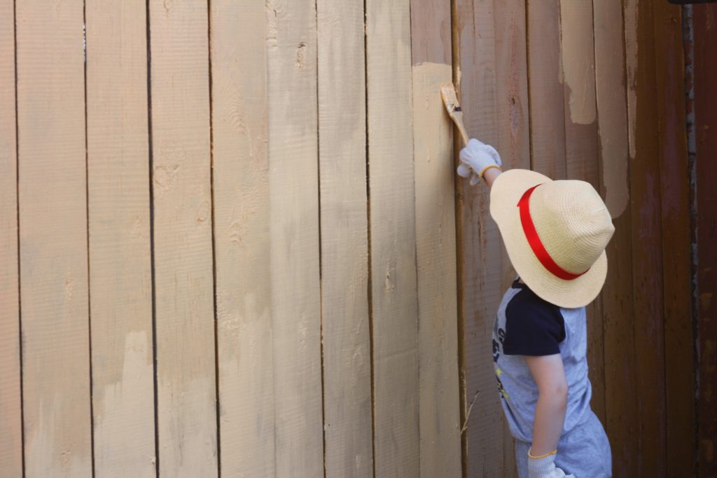 painting a fence